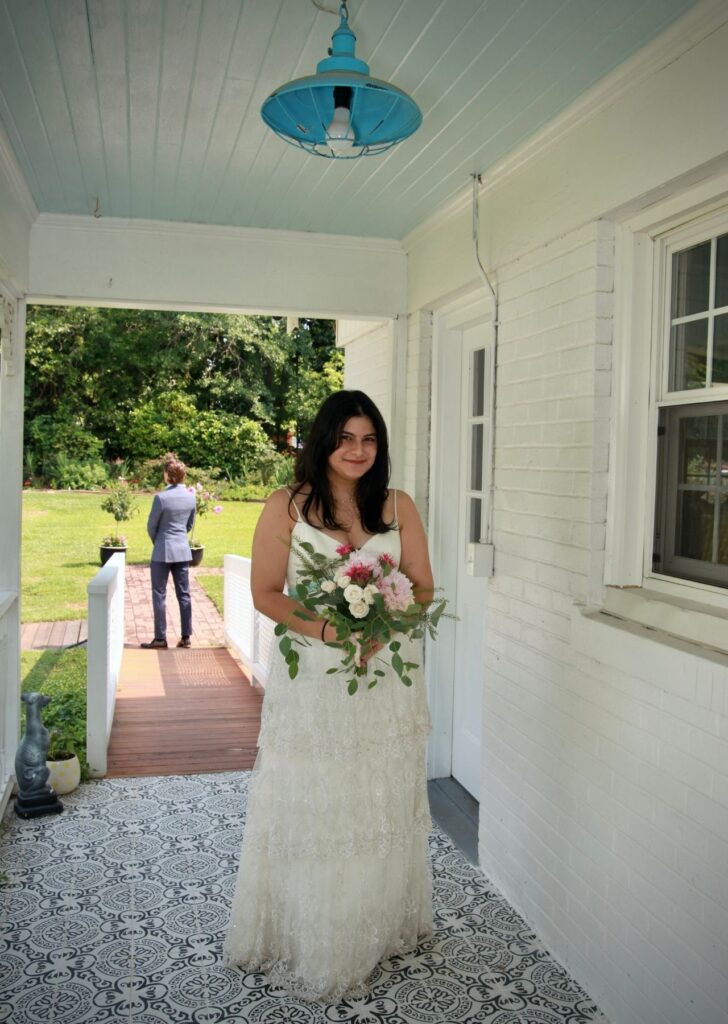Bride and groom performing a first look before their wedding