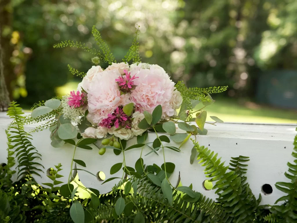 Bouquet On Bench at wedding reception north carolina